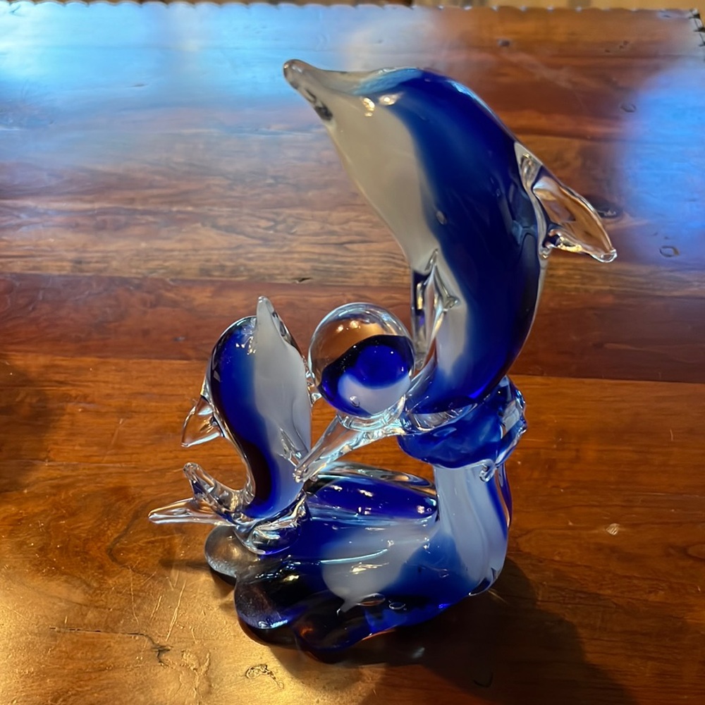 Blue and white Dolphin’s glass sculpture